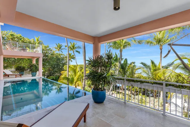 a bathroom with a sink a mirror and a mirror