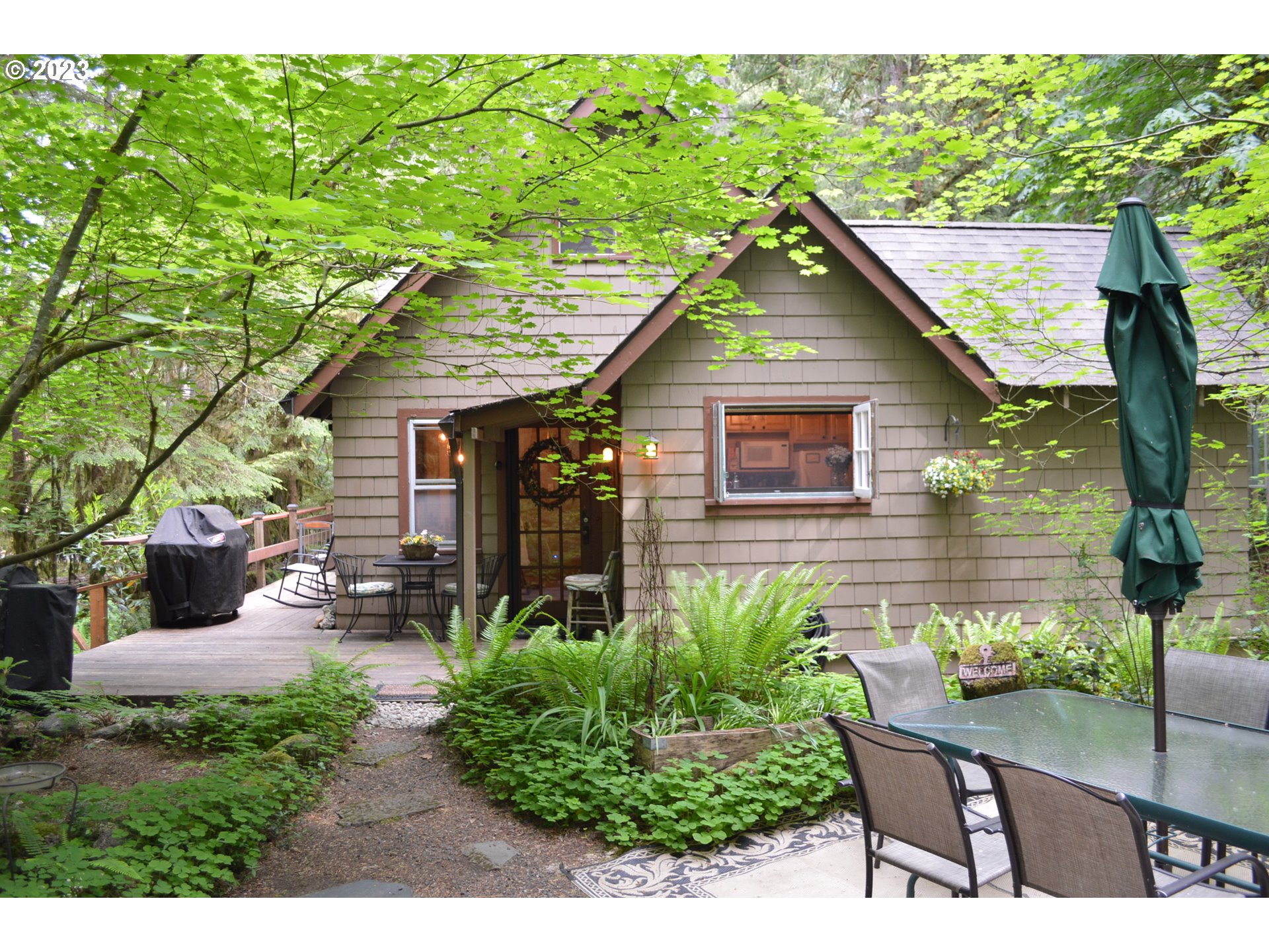 a backyard of a house with seating space