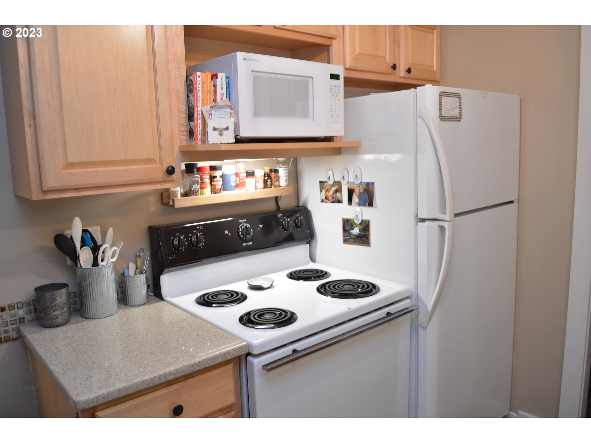 27502 Road 20 Rhododendron, OR 97049 - Photo 14 of 48 a kitchen with a refrigerator and a stove
