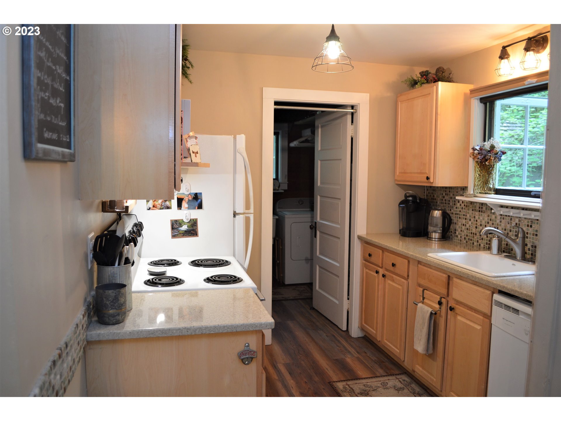 27502 Road 20 Rhododendron, OR 97049 - Photo 16 of 48 a kitchen with a sink cabinets and appliances
