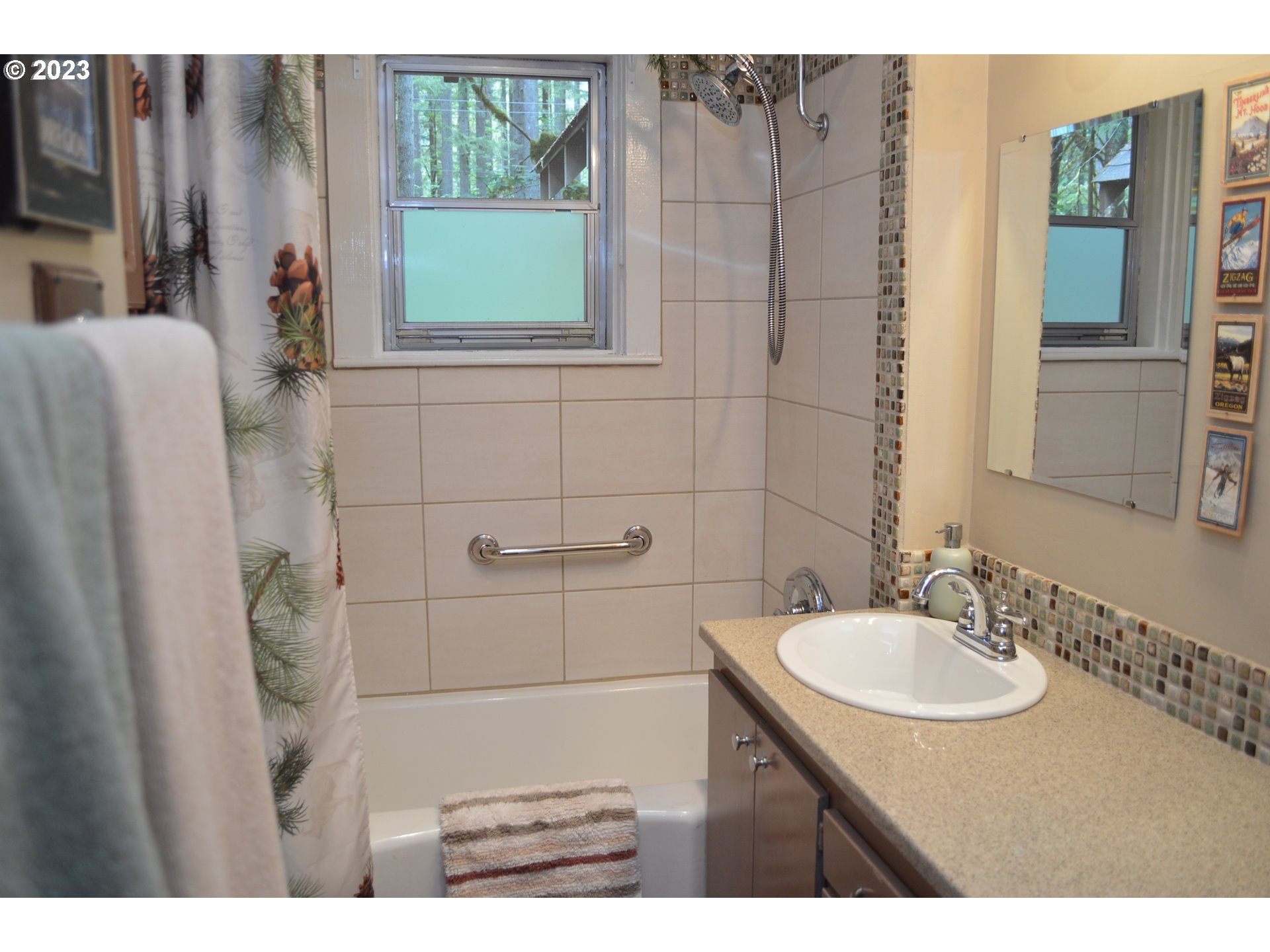 27502 Road 20 Rhododendron, OR 97049 - Photo 19 of 48 a bathroom with a sink and a mirror