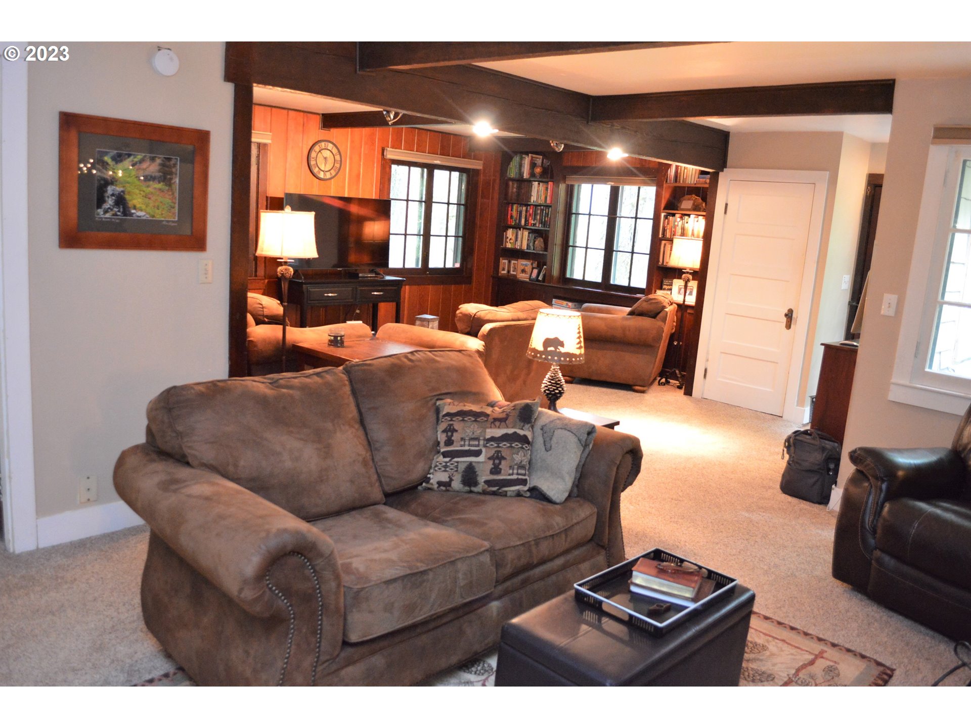 27502 Road 20 Rhododendron, OR 97049 - Photo 21 of 48 a living room with furniture a lamp and a potted plant