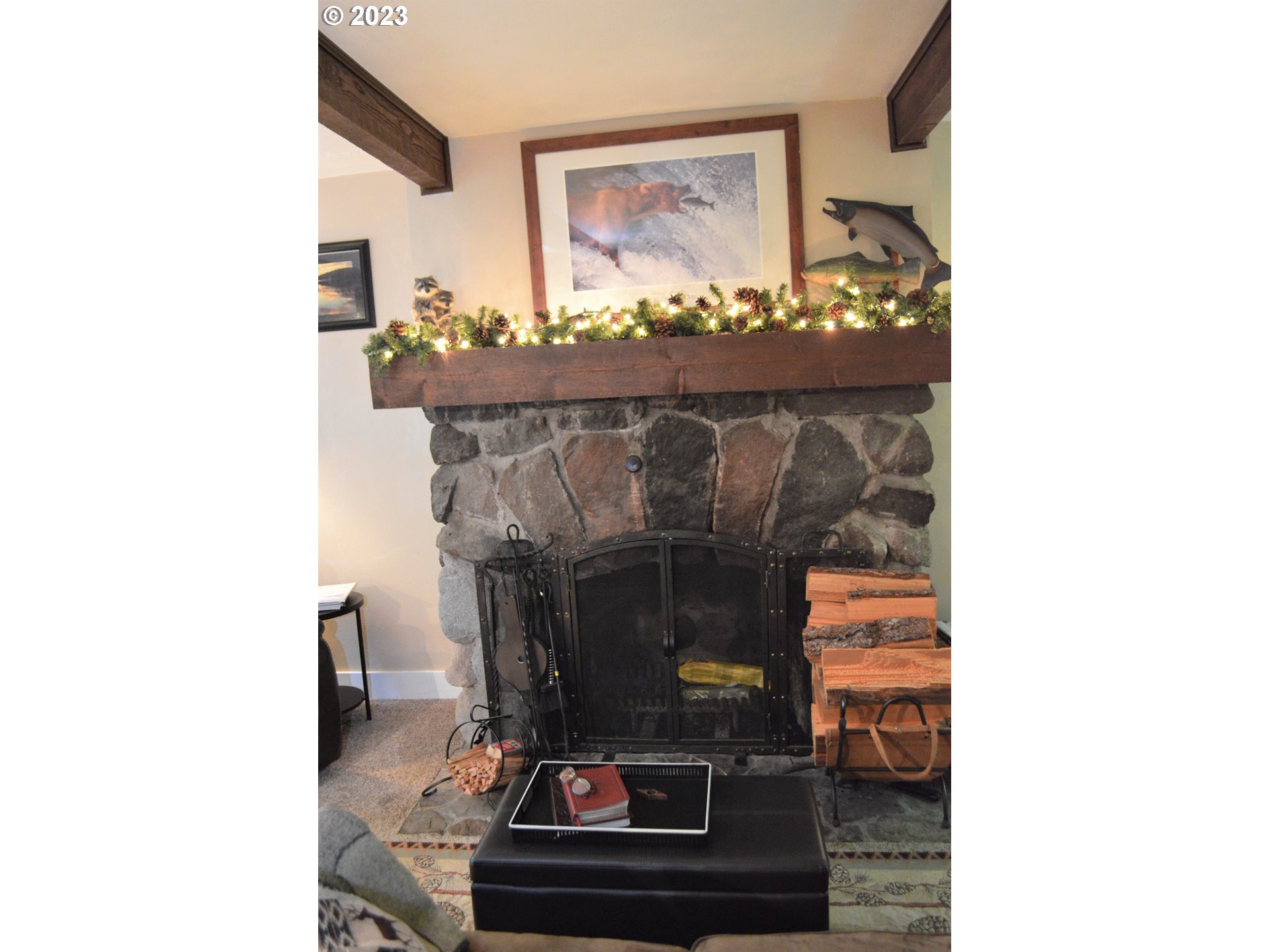 27502 Road 20 Rhododendron, OR 97049 - Photo 23 of 48 a living room with furniture and a fireplace