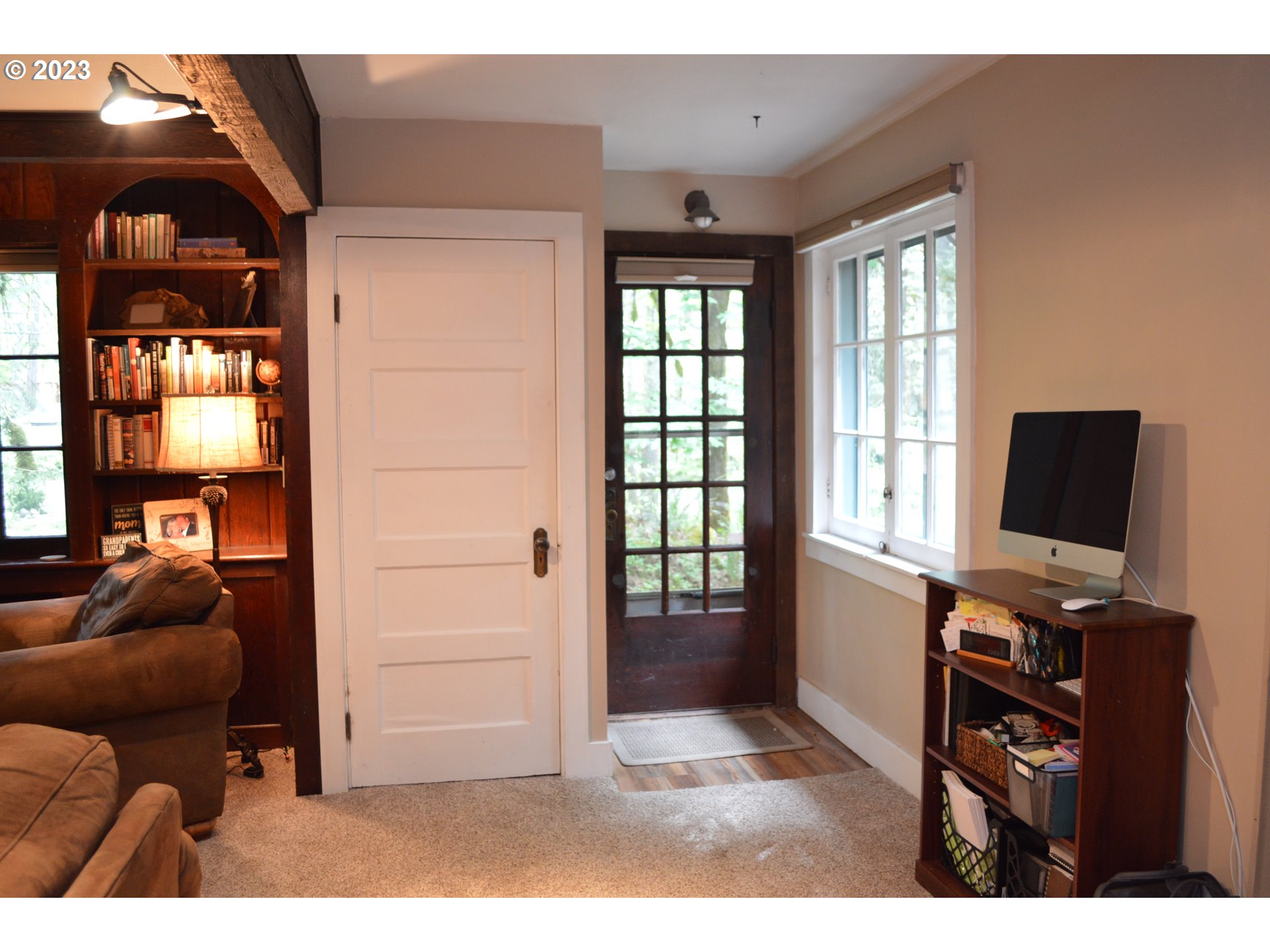 27502 Road 20 Rhododendron, OR 97049 - Photo 24 of 48 a living room with furniture and a flat screen tv
