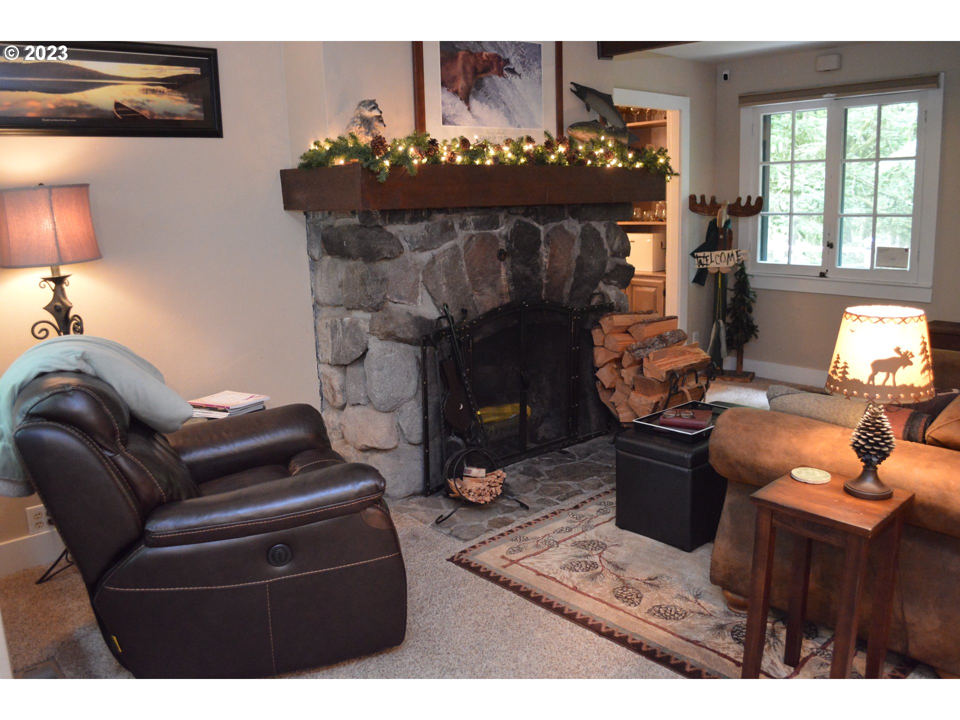 27502 Road 20 Rhododendron, OR 97049 - Photo 25 of 48 a living room with furniture and a fireplace