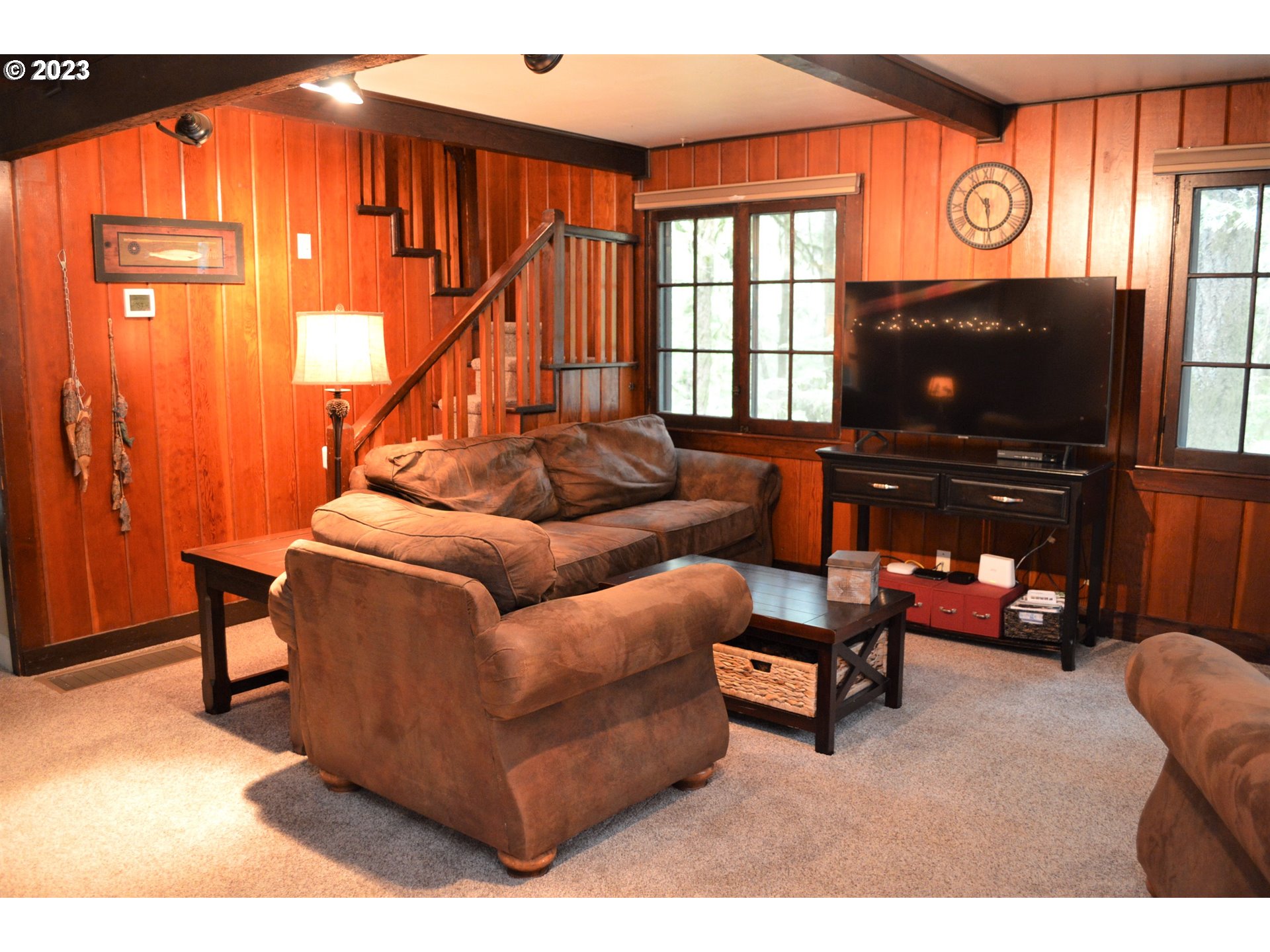 27502 Road 20 Rhododendron, OR 97049 - Photo 29 of 48 a living room with furniture and a flat screen tv