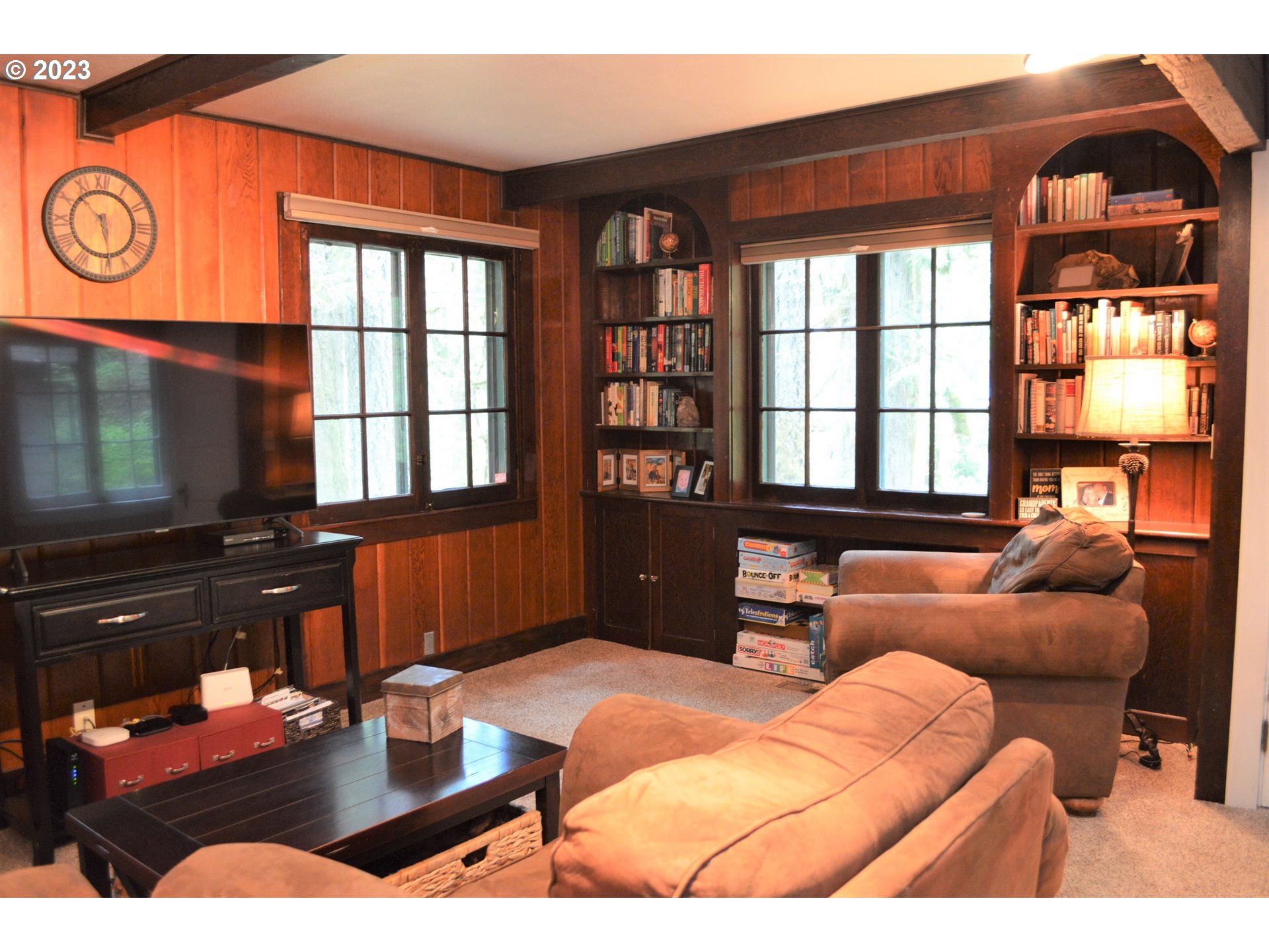 27502 Road 20 Rhododendron, OR 97049 - Photo 30 of 48 a living room with furniture and a flat screen tv