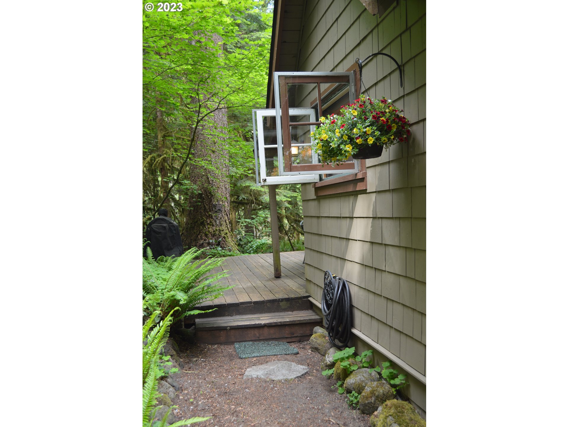 27502 Road 20 Rhododendron, OR 97049 - Photo 3 of 48 a house view with a garden space