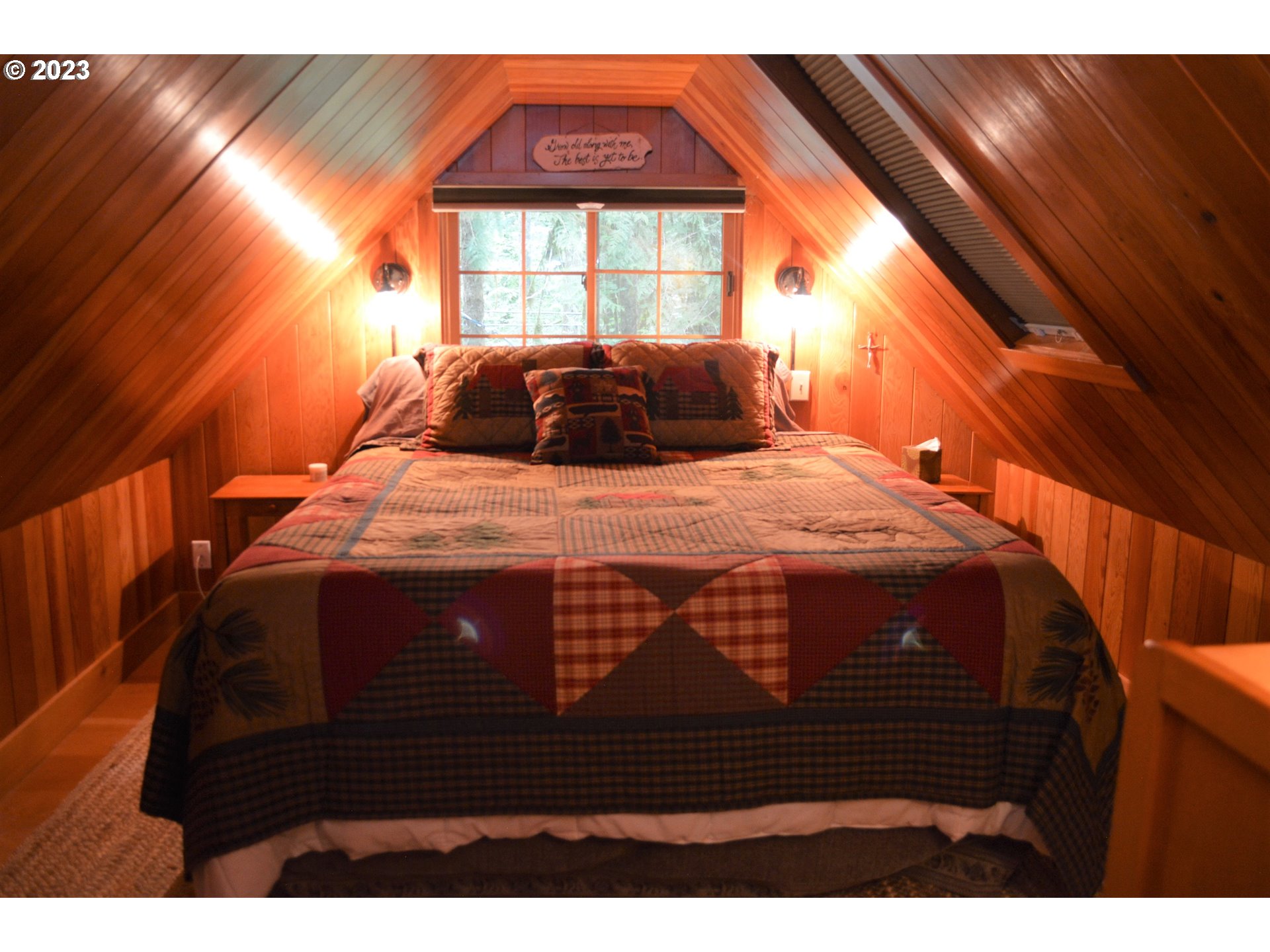 27502 Road 20 Rhododendron, OR 97049 - Photo 37 of 48 a bedroom with a bed and a window