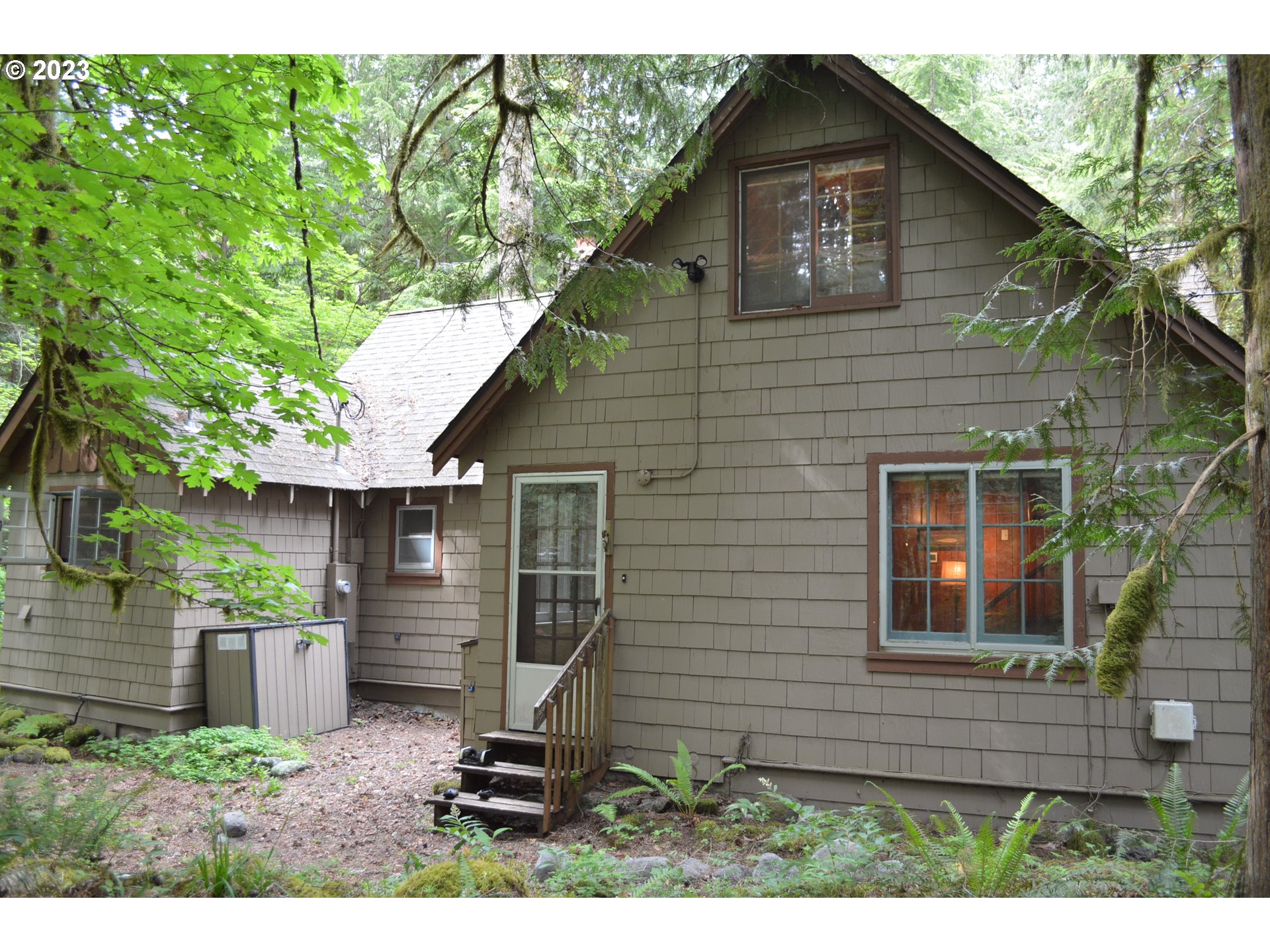 27502 Road 20 Rhododendron, OR 97049 - Photo 4 of 48 a backyard of a house with seating space