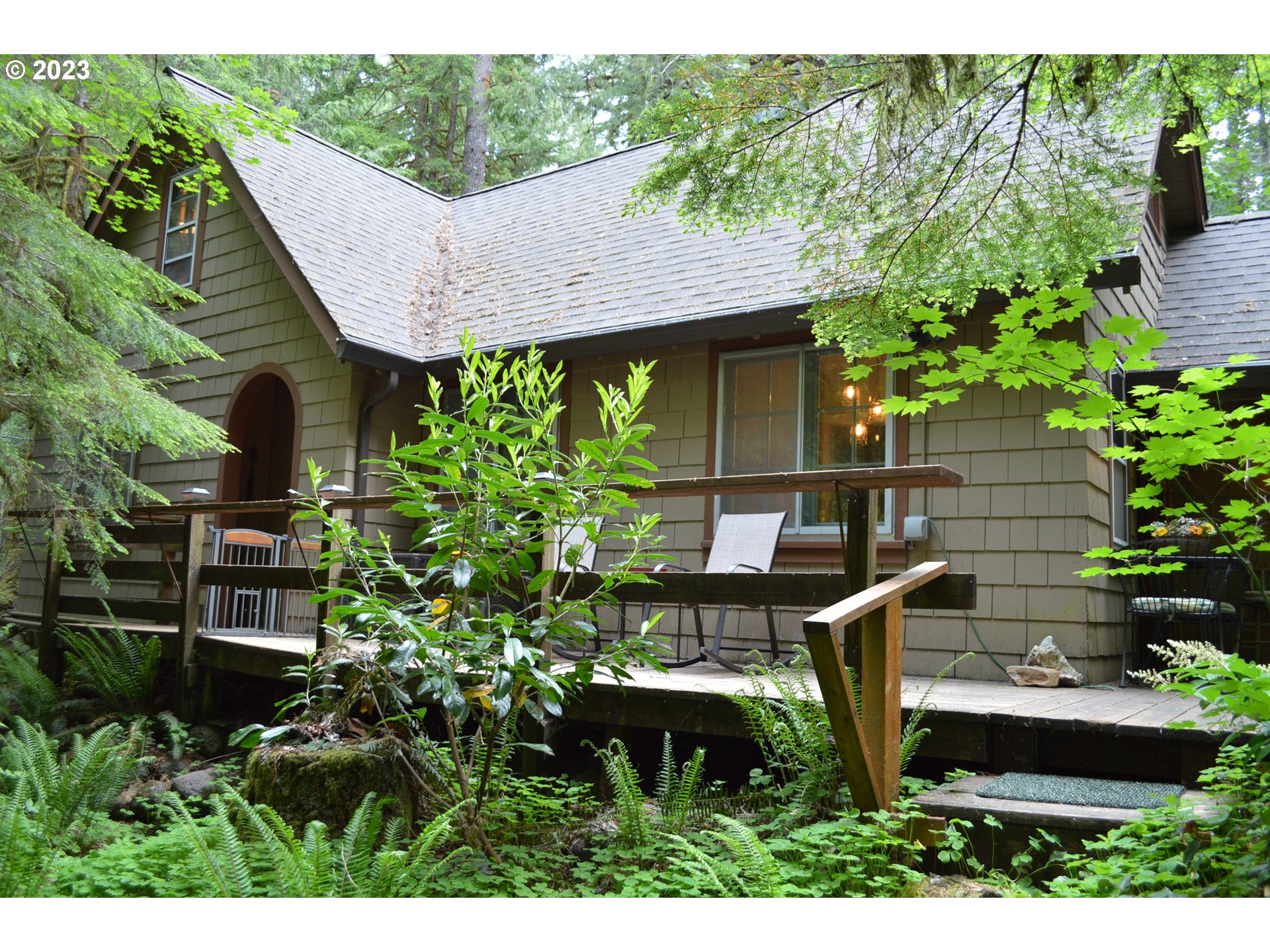 27502 Road 20 Rhododendron, OR 97049 - Photo 7 of 48 a backyard of a house with lots of green space