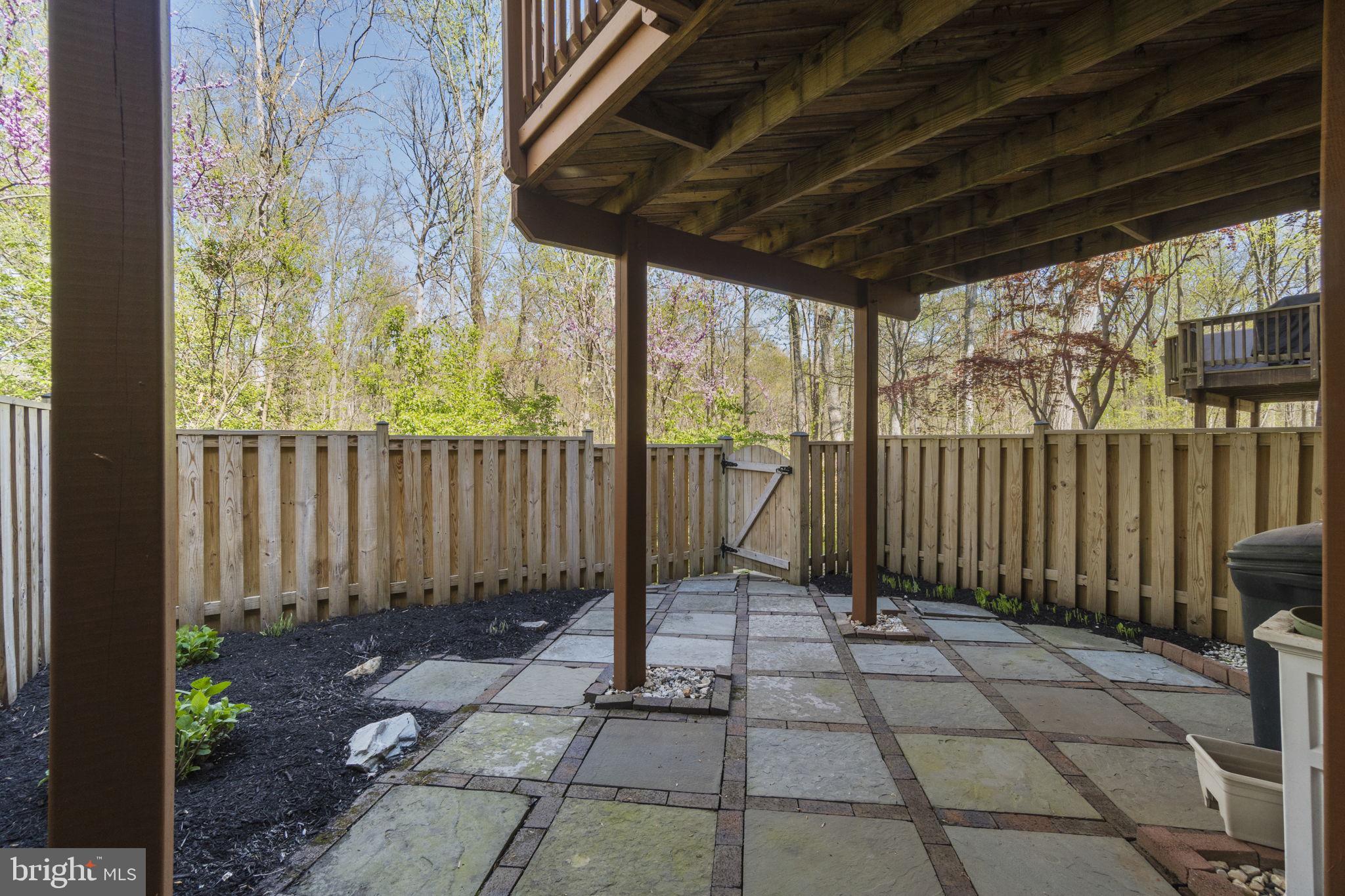 7704 Jewelweed Court Springfield, VA 22152 - Photo 29 of 34 Stone Patio Under Deck