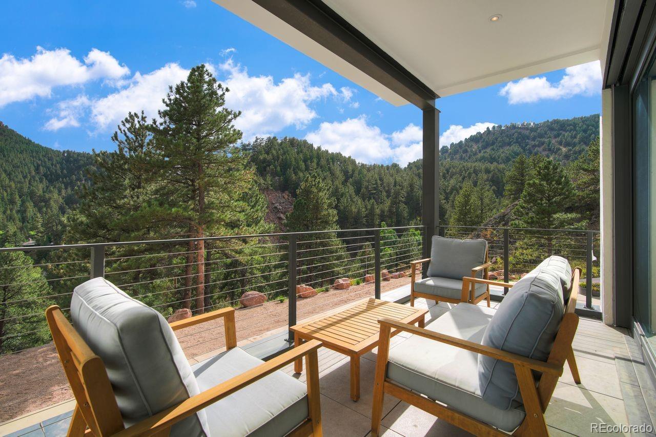 228 Lion Point Boulder, CO 80302 - Photo 13 of 50 a view of a chairs and table in the balcony
