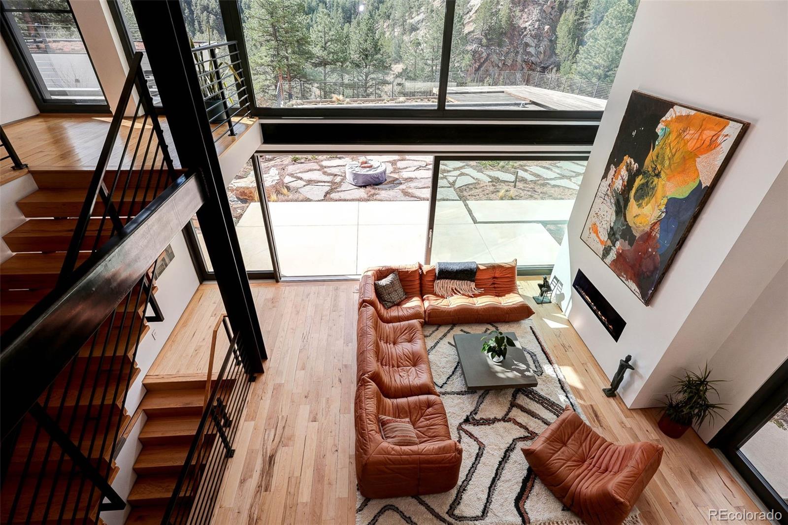228 Lion Point Boulder, CO 80302 - Photo 27 of 50 a living room with furniture and a window