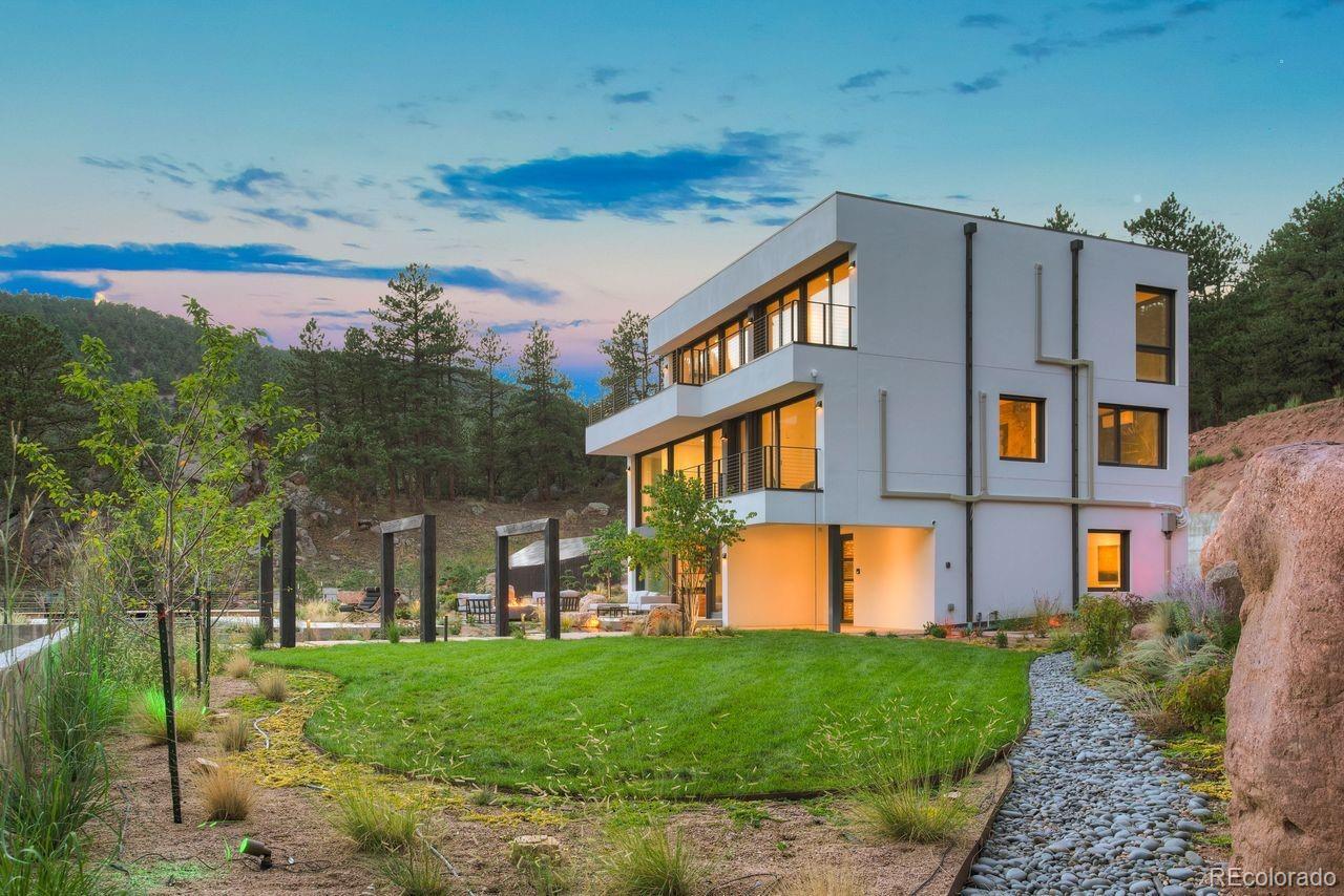 228 Lion Point Boulder, CO 80302 - Photo 47 of 50 a front view of a house with a yard
