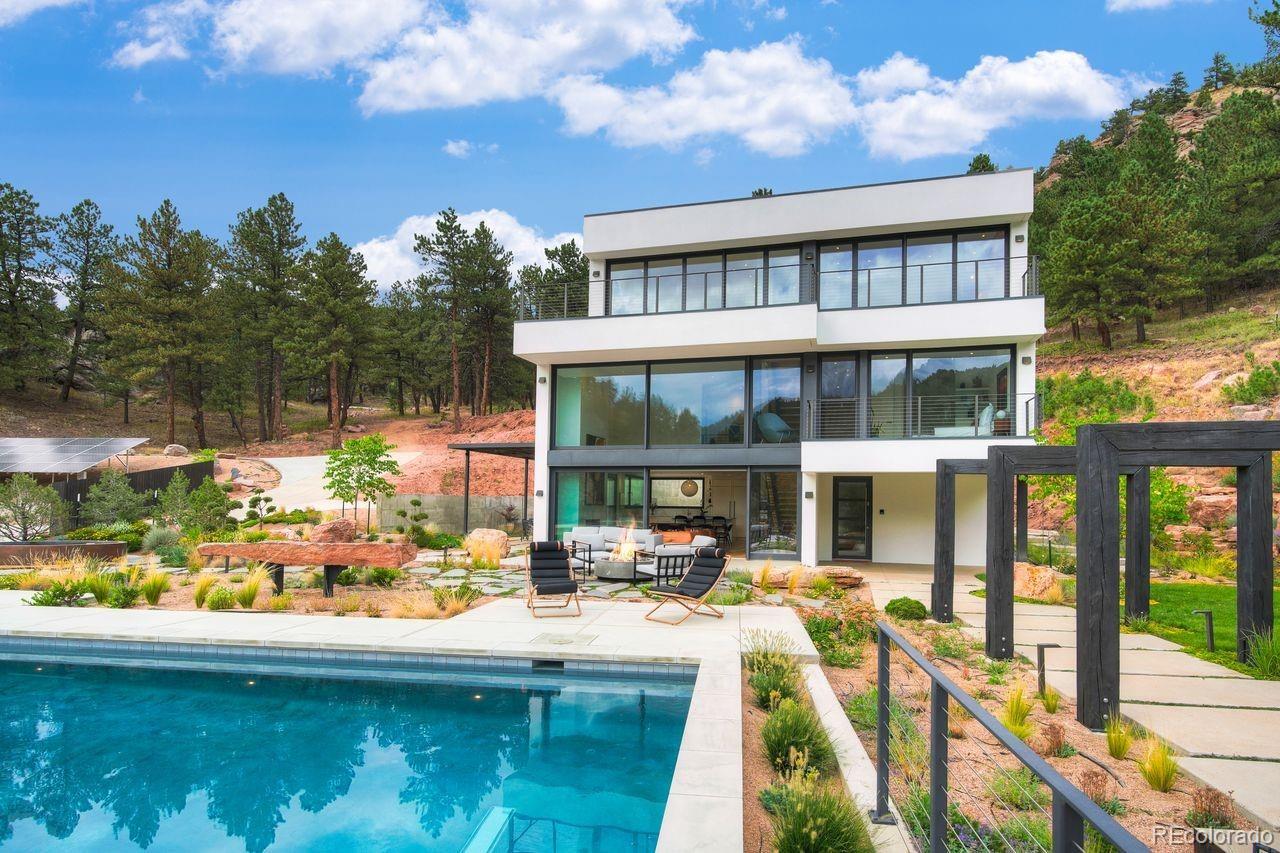 228 Lion Point Boulder, CO 80302 - Photo 10 of 50 a view of a swimming pool with a patio