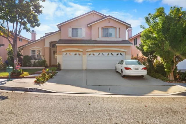 a view of a house with a street