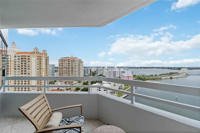 a bedroom with a bed and a lamp