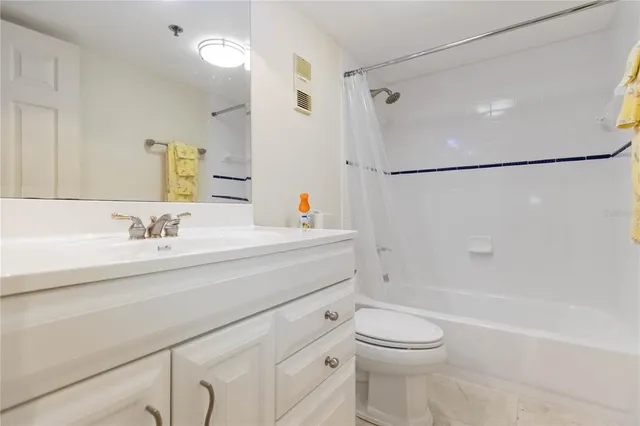 a potted plant sitting in front of a house