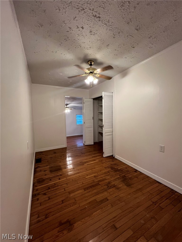1105 Dutch Ridge Road Guysville, OH 45735 - Photo 12 of 33 Warm wood-finish flooring complements light-toned walls
