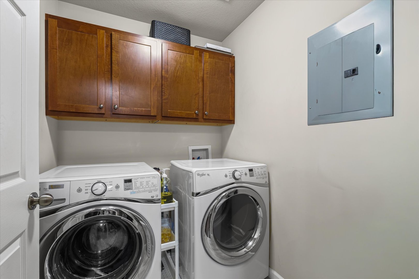 3044 East Stillwater Landing, Unit 201 Urbana, IL 61802 - Photo 20 of 28 a view of a storage and utility room with washer and dryer