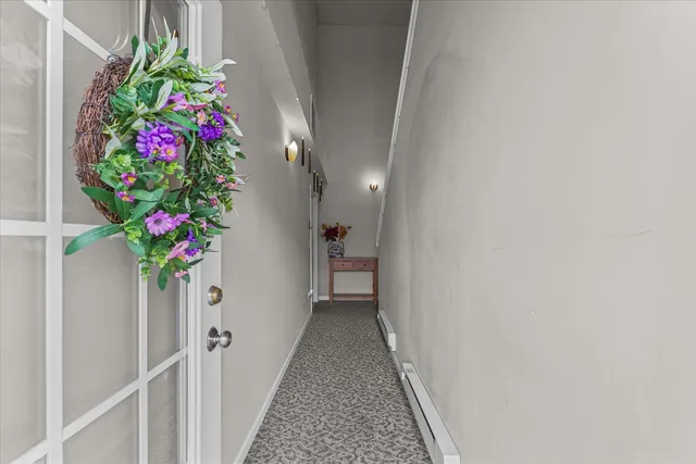 a hallway with flowers and flowers