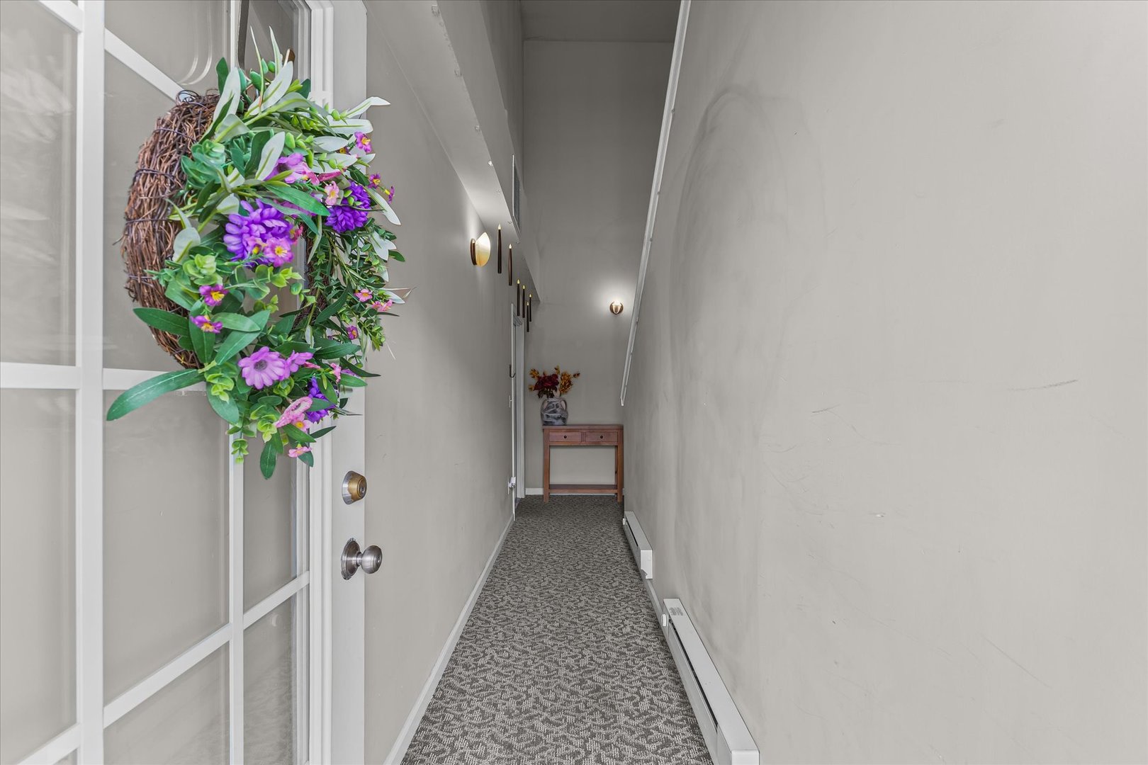 3044 East Stillwater Landing, Unit 201 Urbana, IL 61802 - Photo 6 of 28 a hallway with flowers and flowers