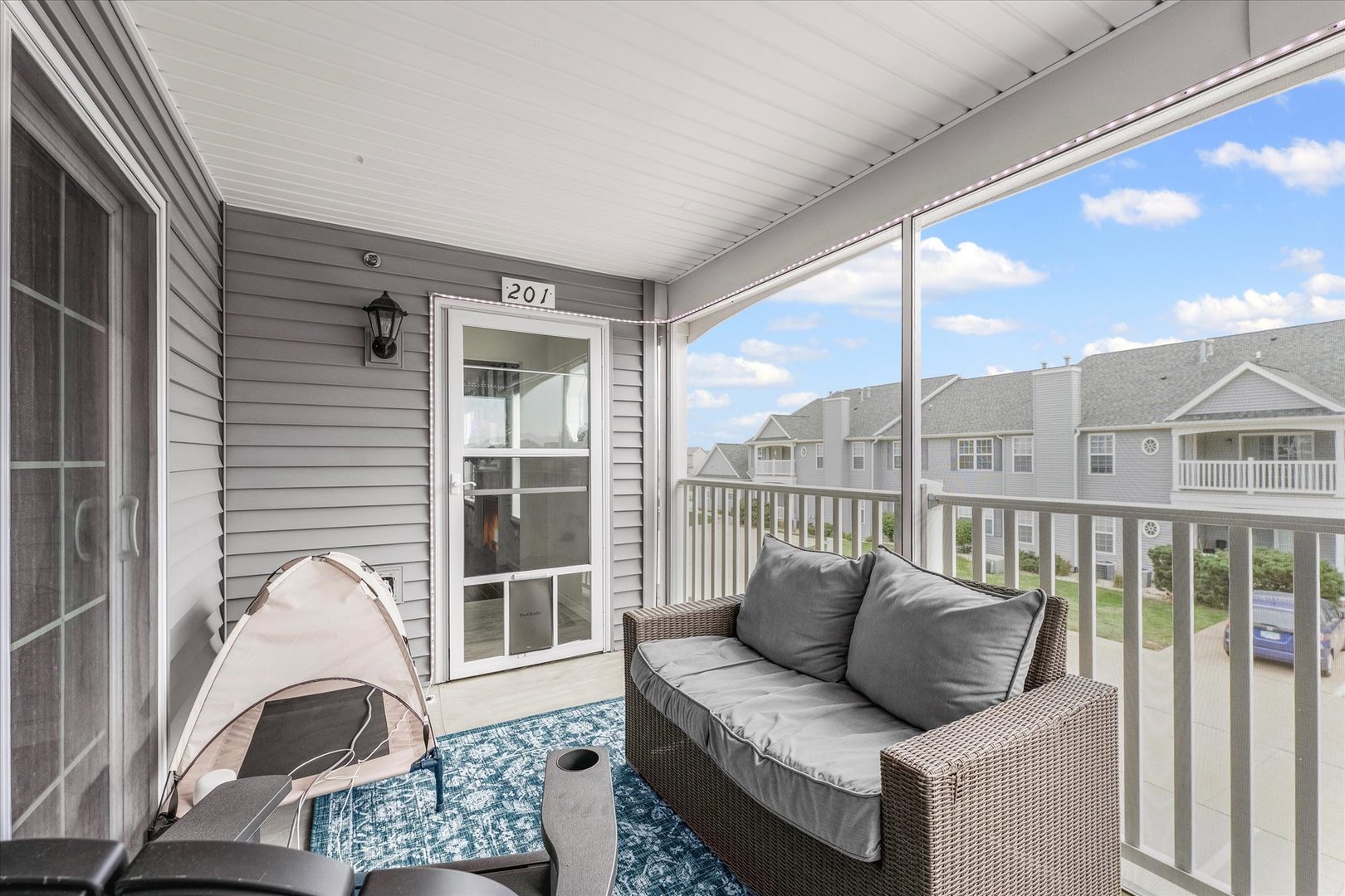 3044 East Stillwater Landing, Unit 201 Urbana, IL 61802 - Photo 8 of 28 a living room with furniture