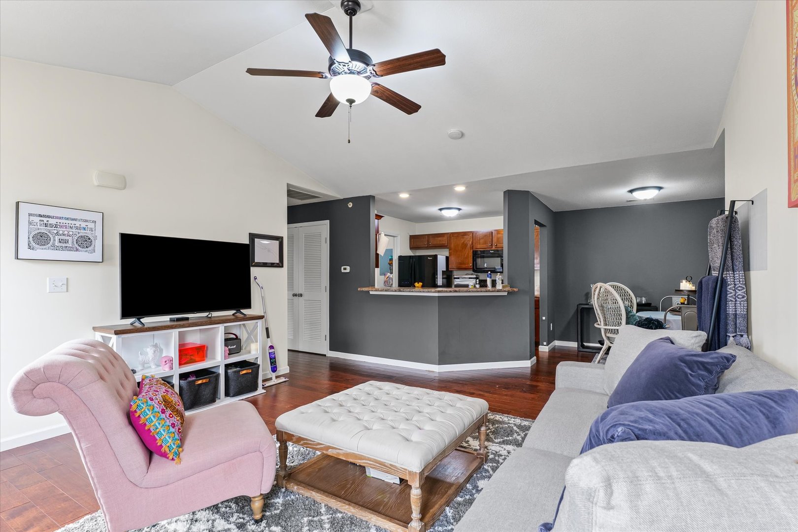 3044 East Stillwater Landing, Unit 201 Urbana, IL 61802 - Photo 10 of 28 a living room with furniture and a flat screen tv