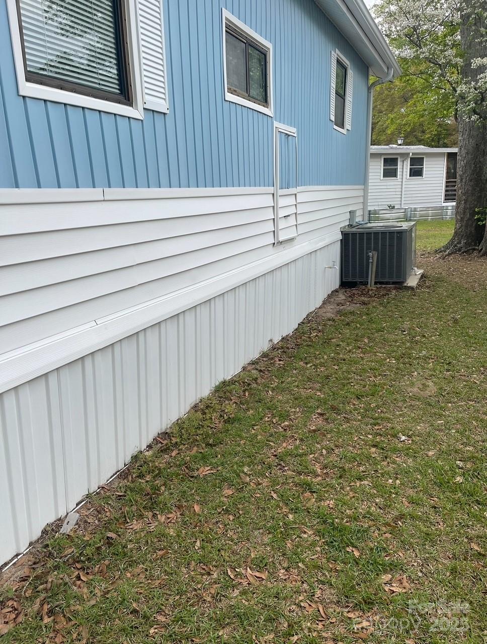 5400 Little River Neck Road, Unit 269 North Myrtle Beach, SC 29582 - Photo 5 of 22 a view of outdoor space and barbecue grill