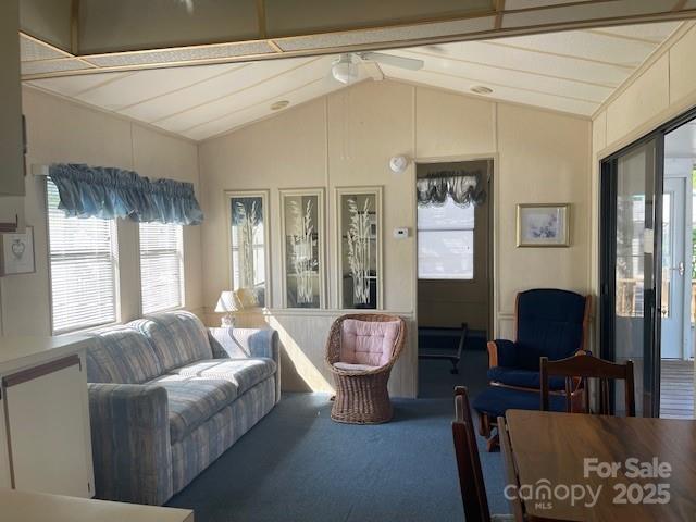 5400 Little River Neck Road, Unit 269 North Myrtle Beach, SC 29582 - Photo 8 of 22 a living room with furniture and a large window