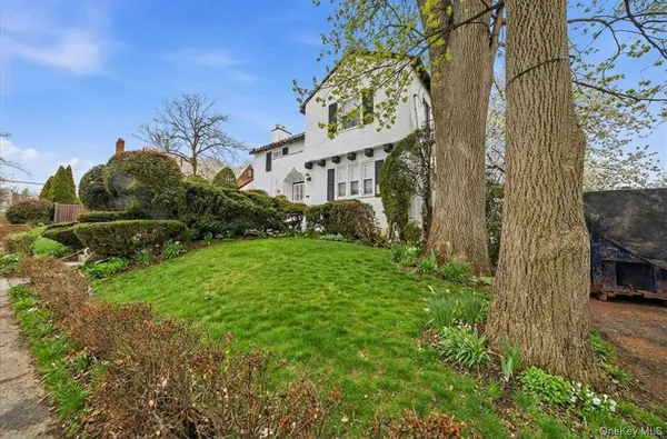 a view of a house with a garden