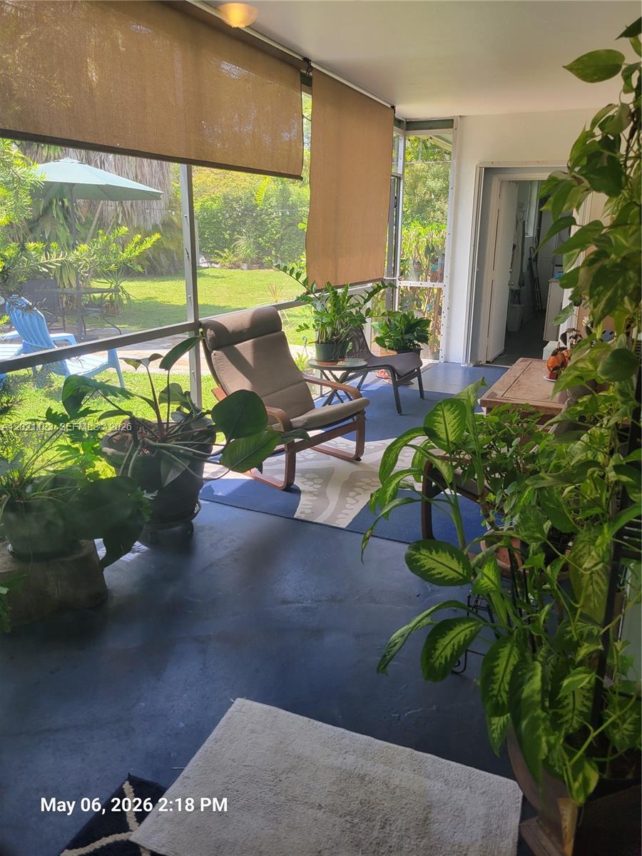 13220 Southwest 99th Place Miami, FL 33176 - Photo 14 of 16 a view of a porch with chairs