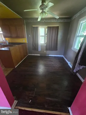 a kitchen with stainless steel appliances granite countertop a sink a stove and a microwave