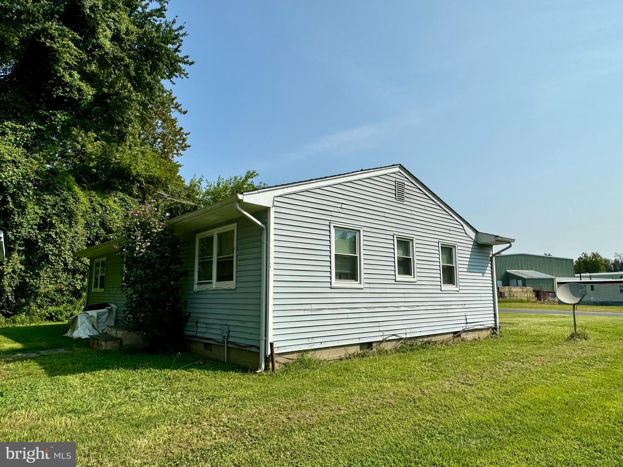 13404 Cannery Road Queen Anne, MD 21657 - Photo 4 of 14 a view of a house with a backyard