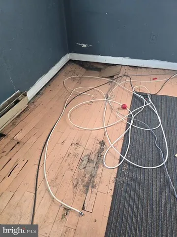 view of a room with wooden floor