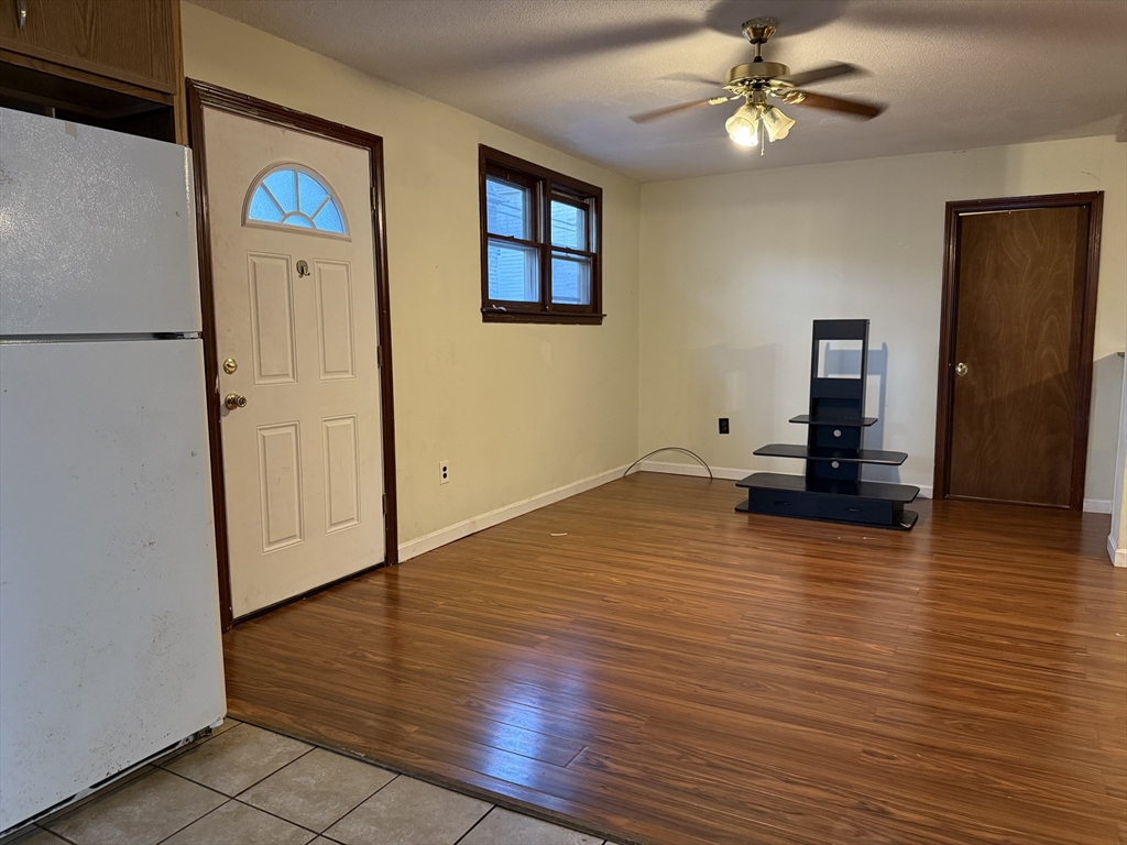 a view of a livingroom with wooden floor