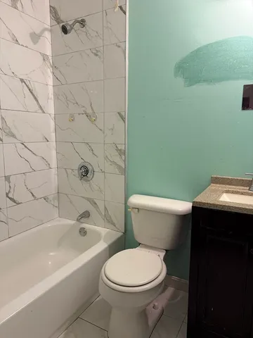 a bathroom with a sink and a toilet