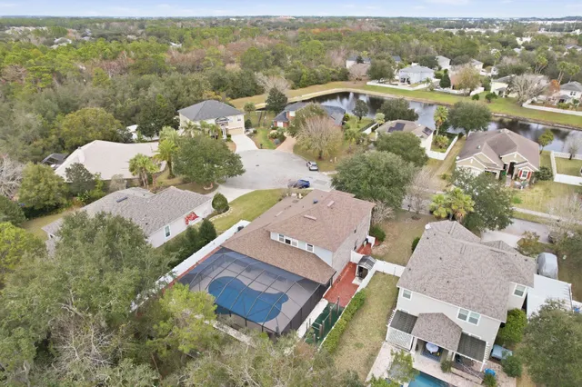 an aerial view of residential house with outdoor space