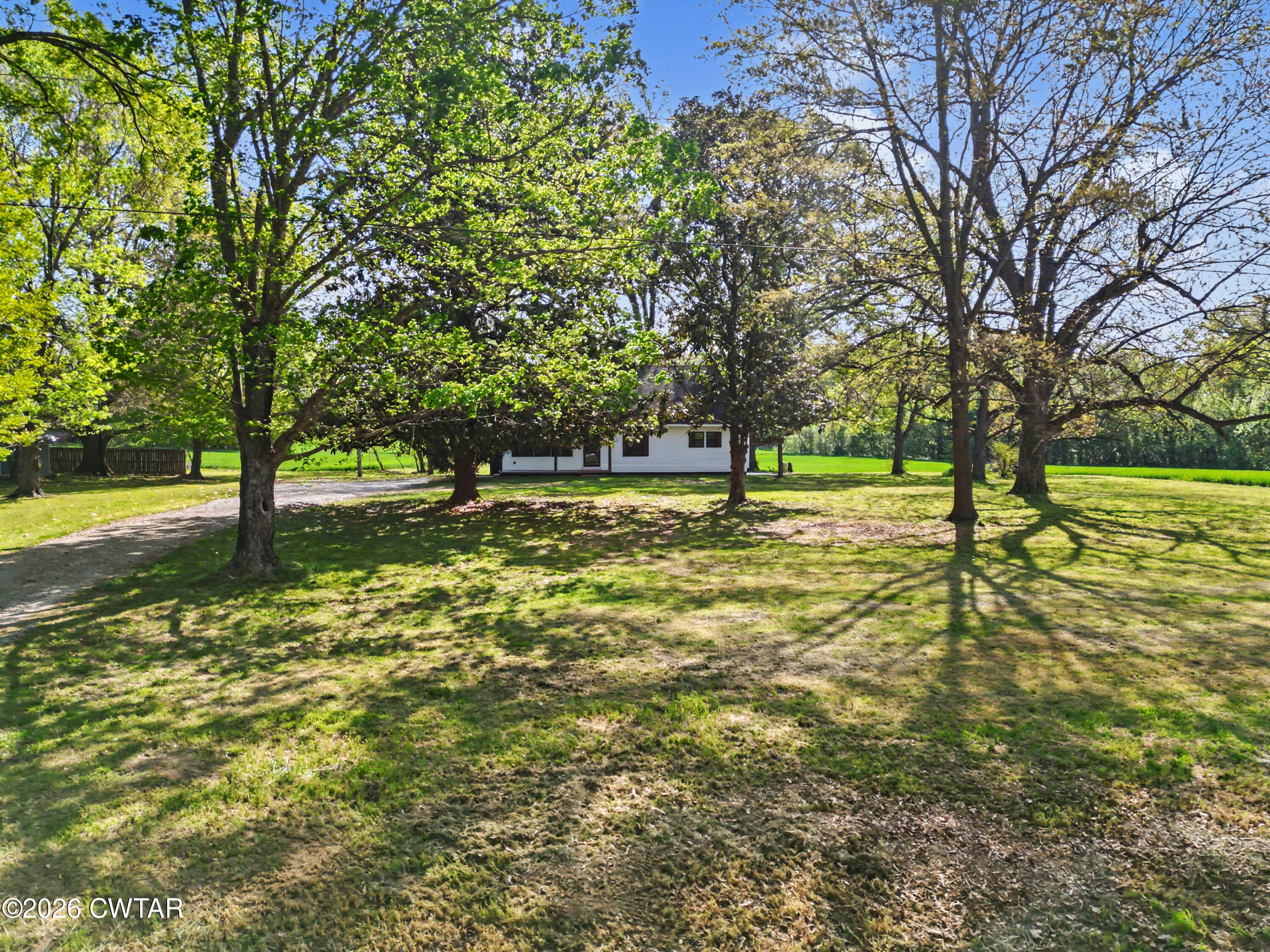 4177 Gum Flat Road Bells, TN 38006 - Photo 2 of 30 a view of yard with swimming pool and trees