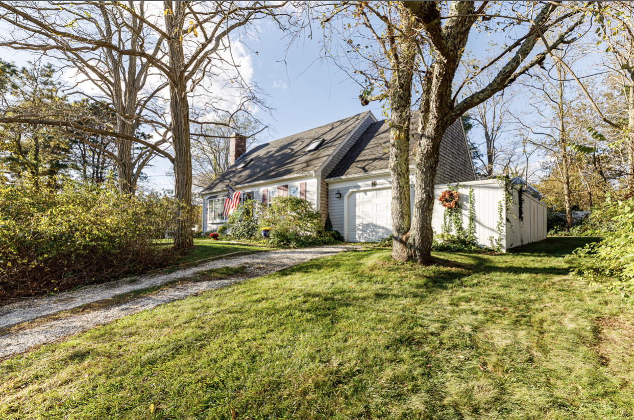 12 Ebenezer Road Osterville, MA 02655 - Photo 1 of 22 a view of a house with a yard