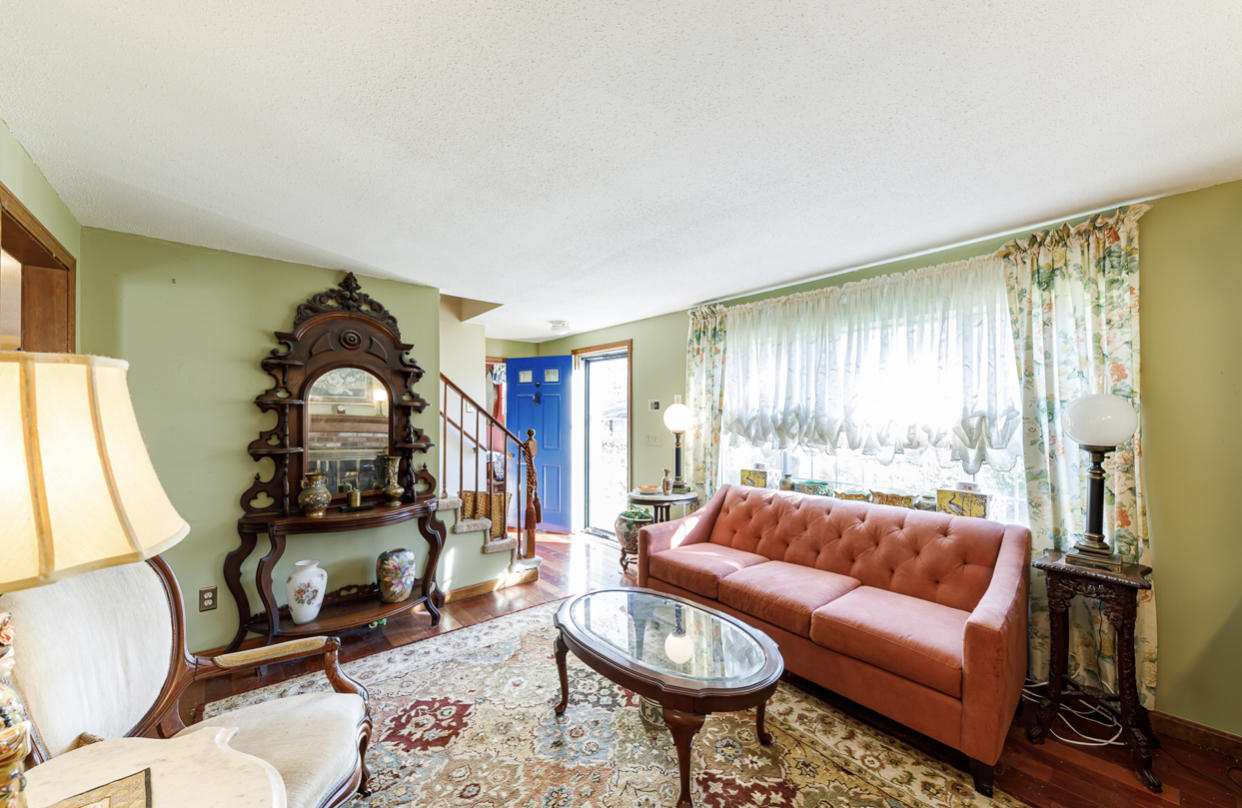 12 Ebenezer Road Osterville, MA 02655 - Photo 12 of 22 a living room with furniture and a large window
