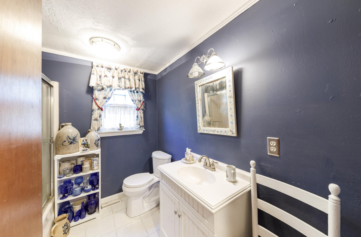 12 Ebenezer Road Osterville, MA 02655 - Photo 14 of 22 a bathroom with a toilet sink and mirror
