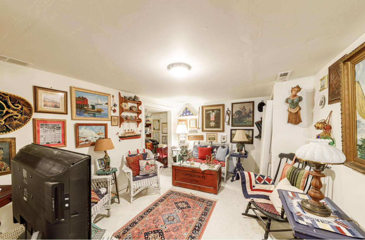 12 Ebenezer Road Osterville, MA 02655 - Photo 22 of 22 a bedroom with furniture and a book shelf