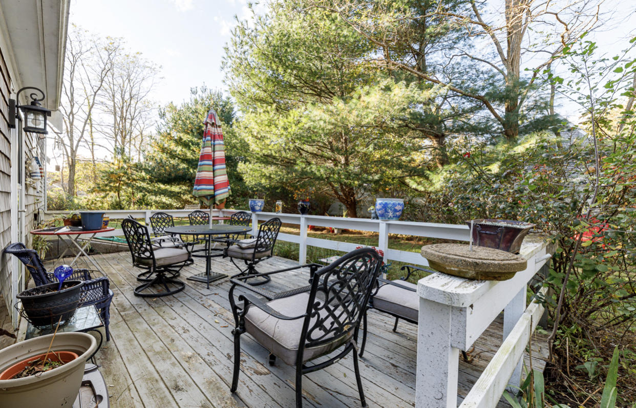 12 Ebenezer Road Osterville, MA 02655 - Photo 7 of 22 a view of a chairs and table in the terrace
