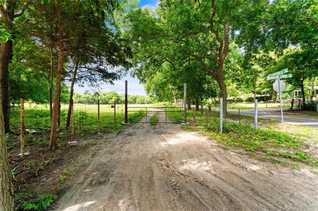 1213 South Houston School Road Lancaster, TX 75146 - Photo 1 of 6 a view of a park with trees in the background
