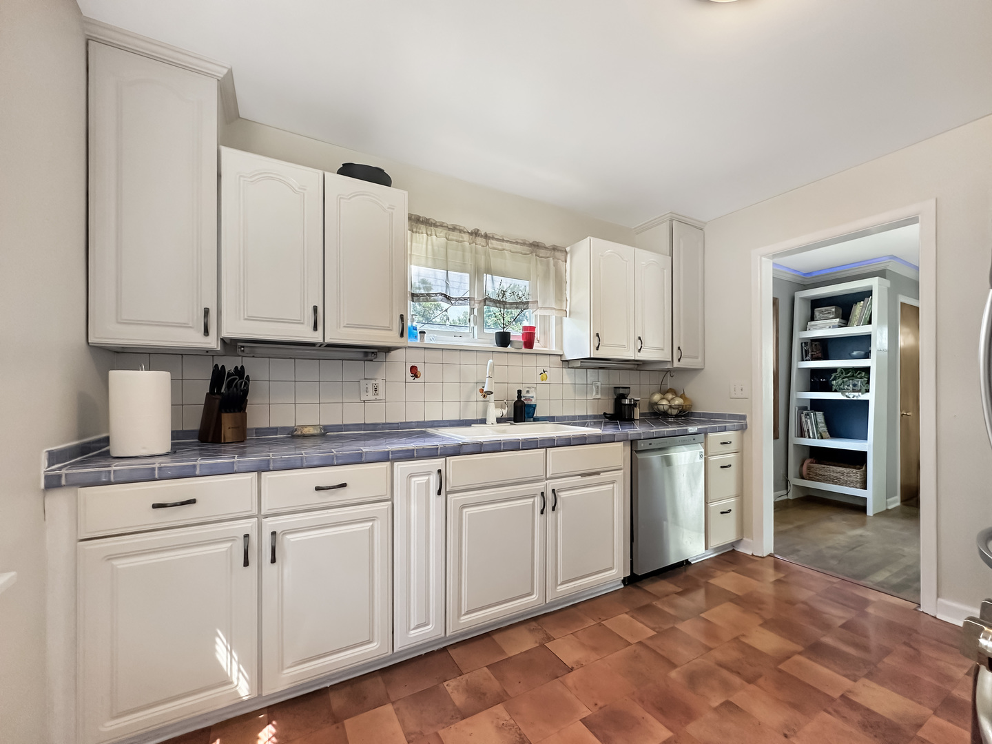 1 Hawthorne Road Lake In The Hills, IL 60156 - Photo 6 of 22 a kitchen with granite countertop white cabinets and sink