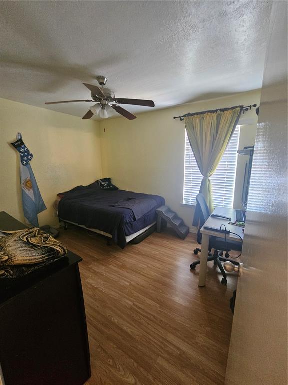1823 East Grauwyler Road, Unit 198 Irving, TX 75061 - Photo 3 of 9 a room with a bed and a window