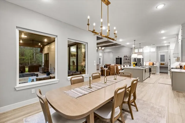a bedroom with a bed and a ceiling fan