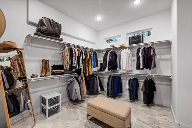a view of a kitchen with a sink and refrigerator